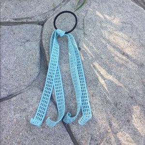 Hair tie ponytail holder with teal ribbon